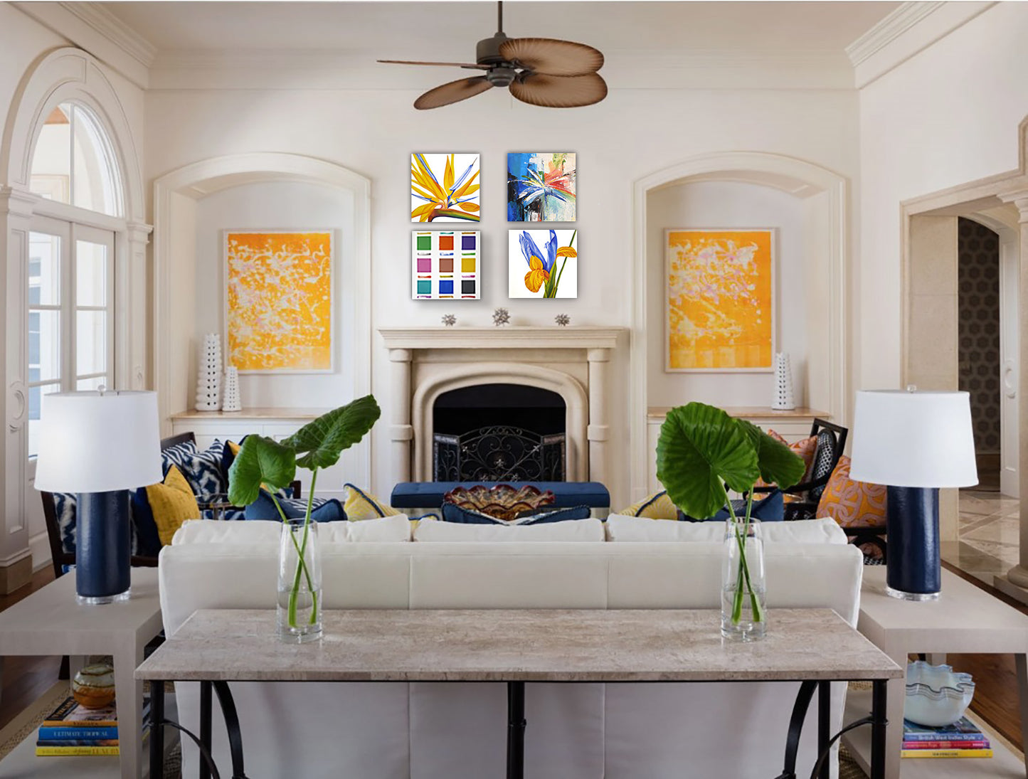 Living room with a white sofa, coffee table, and colorful abstract paintings on the wall.