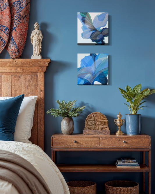 Decorative bedroom with blue walls, wooden furniture, and abstract art.